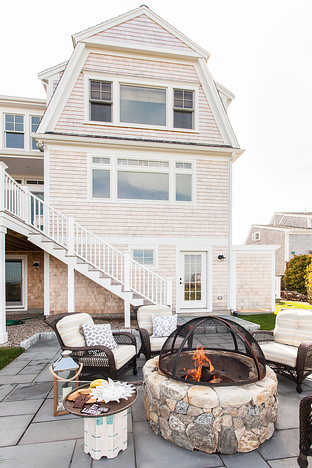 Dennis Bayview Cape rear with firepit resized 600