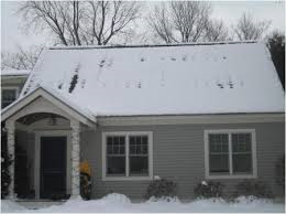 snowy roof and portico resized 600